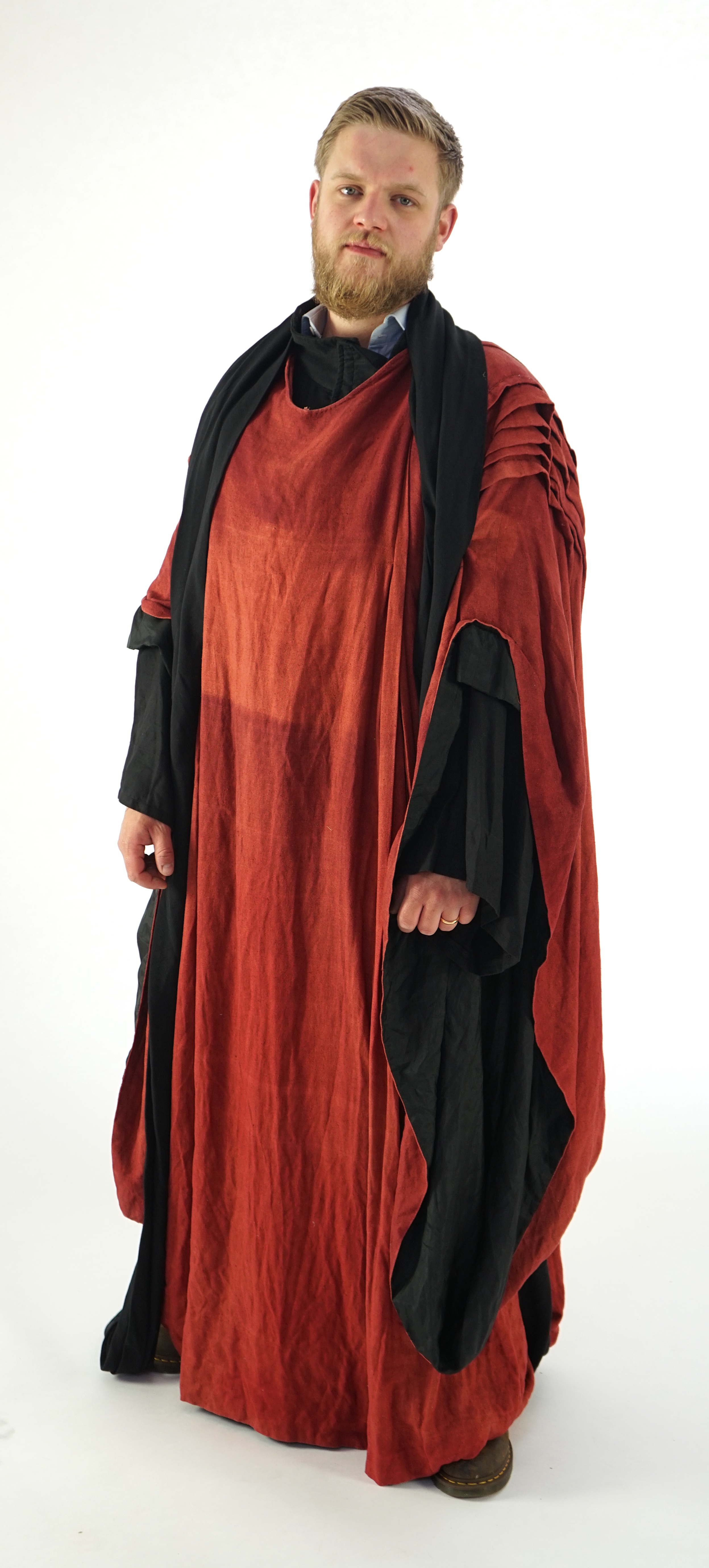 A Priest's inner and outer robe and large belt (rust coloured and black). Ex Glyndebourne Festival Opera 'Idomeneo'